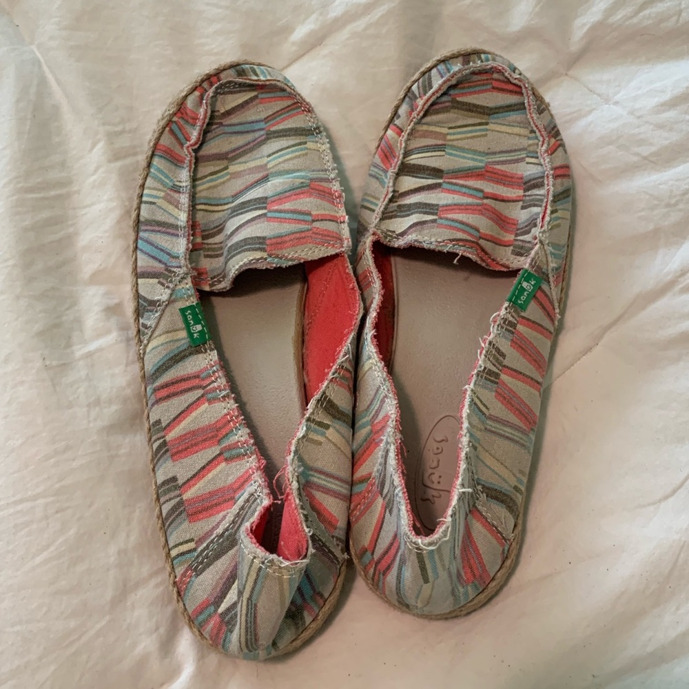 Sanuk slip ons